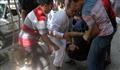  
نقل جريح أصيب أثناء مظاهرات رافضة للانقلاب بمنطقة المطرية في القاهرة (الفرنسية) 